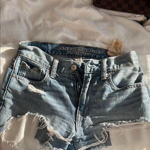 Light Blue Distressed Jean Shorts with Frayed Hem